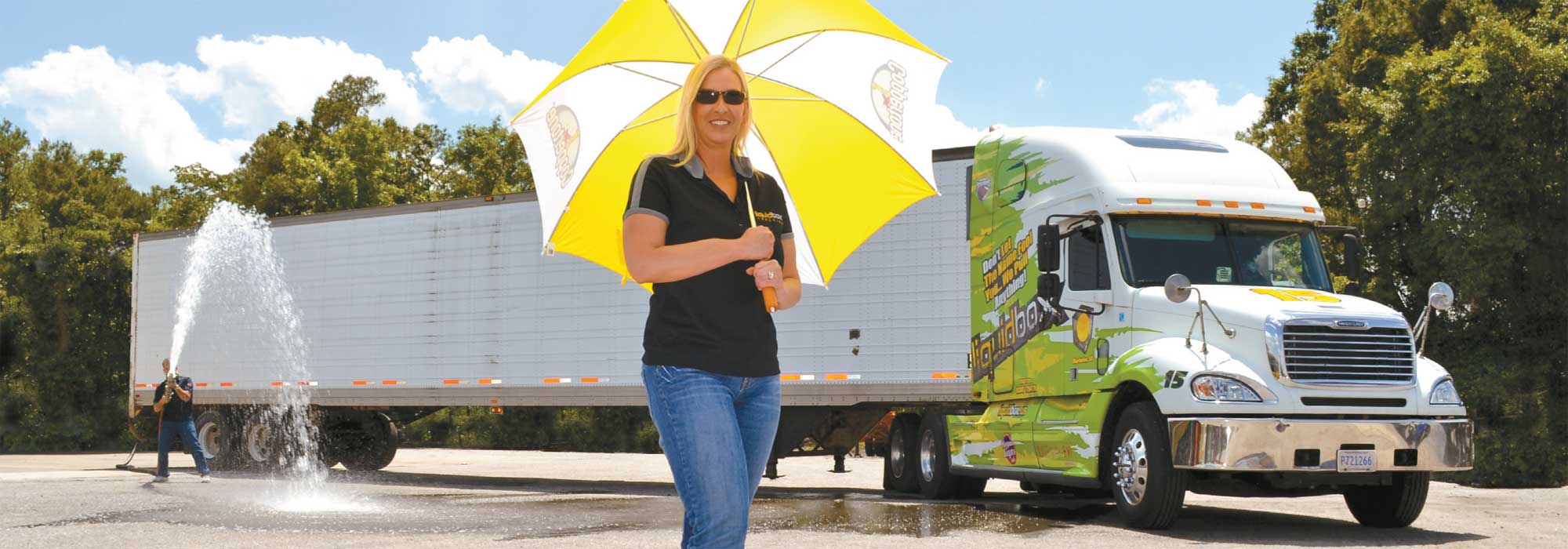 woman in front of truck